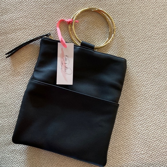 La Diva black handbag with 2 gold ring handles. Zip top. 3 pockets inside - Picture 1 of 5
